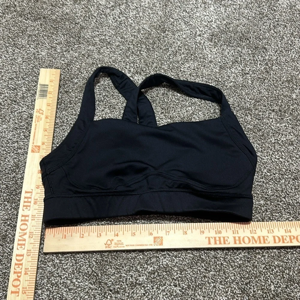 Fabletics and old navy black medium sports bras. Zipper front. Neon. Set of 2